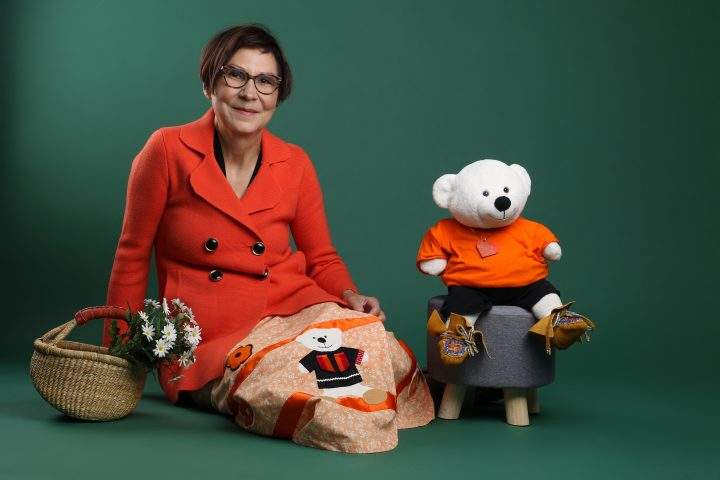Cindy Blackstock pictured wearing a skirt specially designed for Orange Shirt Day by students at Seneca College in Toronto.