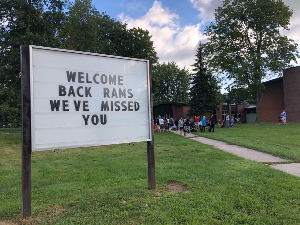 Students at John P. Robarts Public School in east London, Ont., line up outside ahead of the first day of classes for the 2021-2022 academic year.