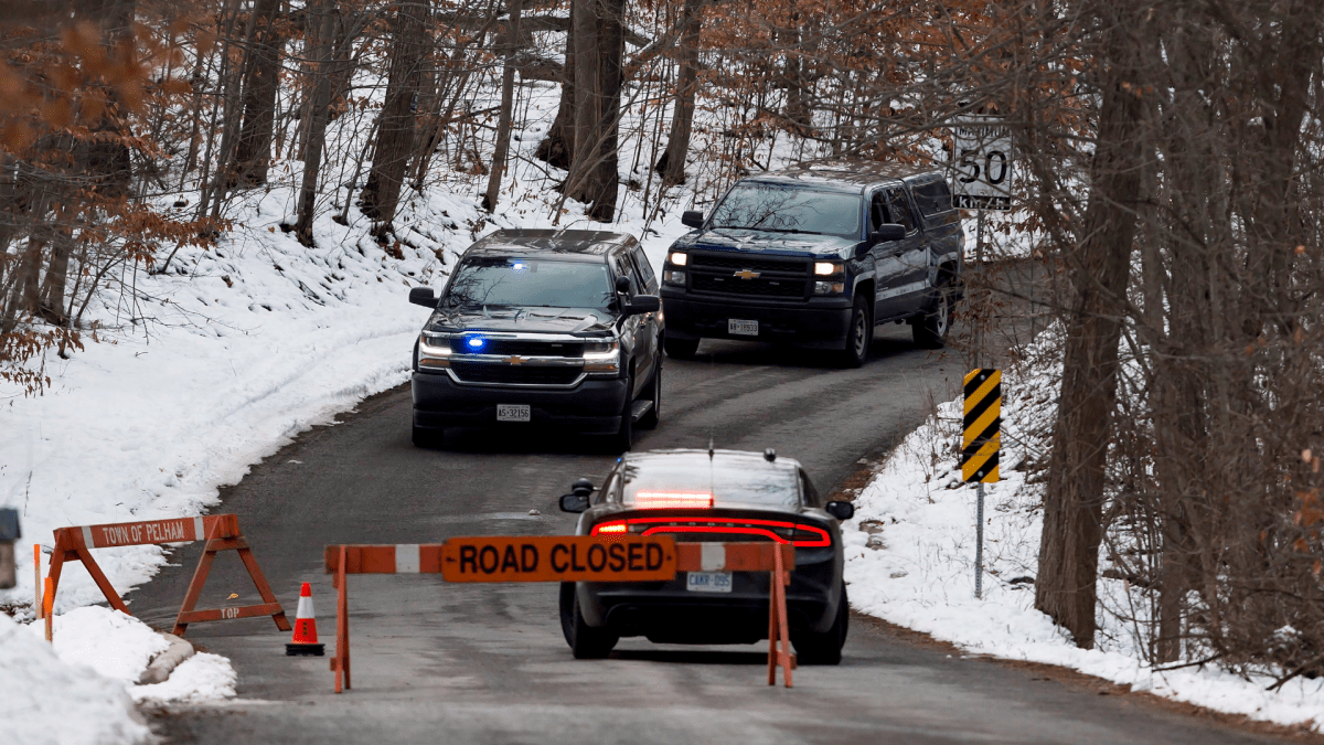 Niagara Regional Police, OPP and the SIU attend a scene near Roland Road and Sulphur Spring Drive in Pelham, Ont., where a Niagara Regional Police officer was shot by a fellow officer, Thursday, Nov. 29, 2018. THE CANADIAN PRESS/Aaron Lynett .
