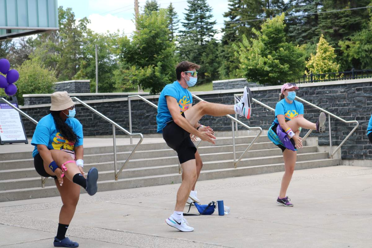 Residency advisors and frosh week volunteers helping new students get excited to move into residency at Western University during the first week of school on Sept. 3, 2021