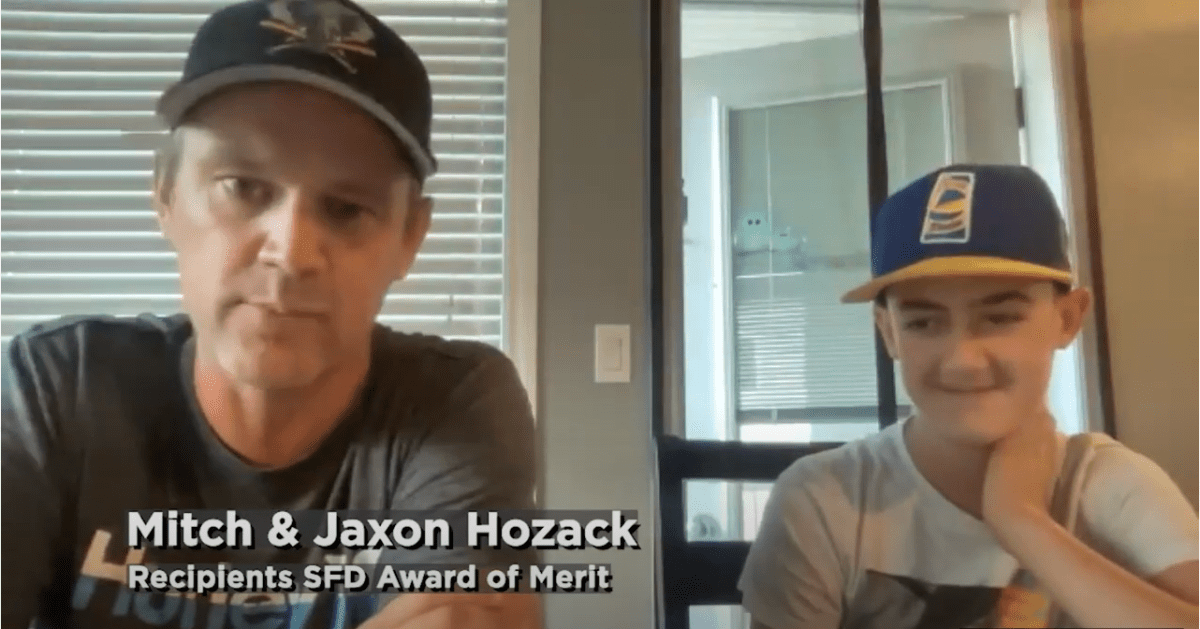 Mitch and Jaxon Hozack were given the SFD Award of Merit by Fire Chief Morgan Hackl for their quick action and heroic efforts during a house fire in July.