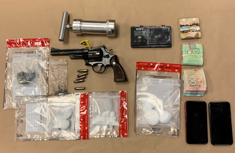 Kingston police seize guns, drugs in search of residence - image