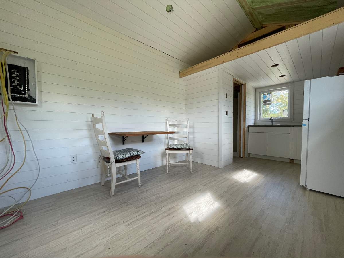 Each tiny home has a full kitchen, three-piece bathroom and living space.