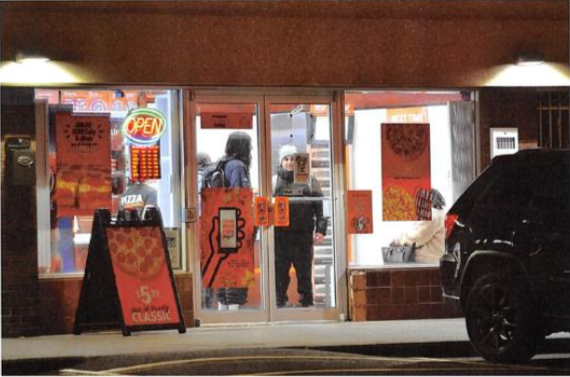 Surveillance photo of men identified by police as Kevin Omar Mohamed and Daniel Khoshnood, at a Toronto pizza shop, Nov. 19, 2019.
