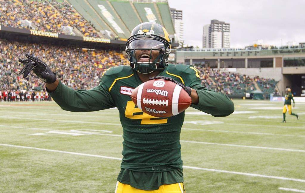 Edmonton's D'haquille (Duke) Williams (81) celebrates a touchdown during first half CFL action against the Calgary Stampeders, in Edmonton, Saturday, Sept. 8, 2018. The Saskatchewan Roughriders signed Williams, a free-agent receiver, on Monday.