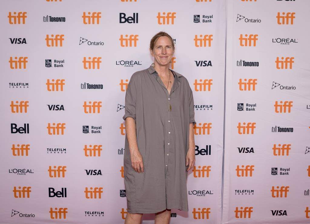 Author Miriam Toews poses for a photograph on the red carpet premiere for the film 'All My Puny Sorrows' at the Princess of Wales Theatre during the 2021 Toronto International Film Festival in Toronto, Saturday, Sept. 11, 2021.