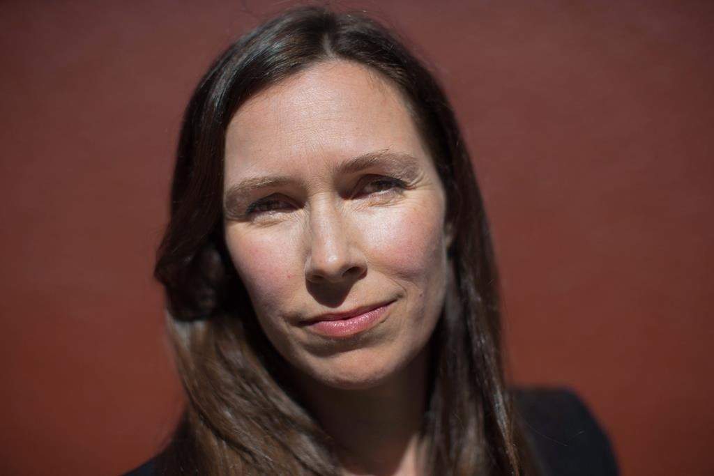 Grace Pastine, litigation director for the B.C. Civil Liberties Association, stands for a photograph outside her office in Vancouver on Thursday, August 18, 2016. THE CANADIAN PRESS/Darryl Dyck.