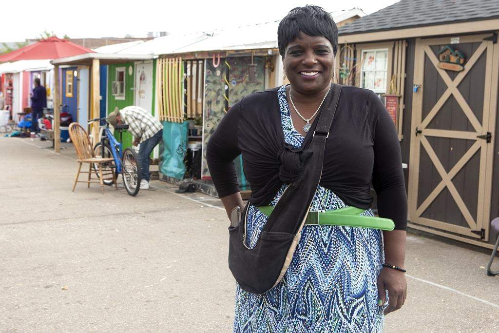 Nadine Green is pictured in the "A Better Tent City," community in Kitchener, Ont., on Thursday, October 14, 2021. The community provides small cabins set up as an alternative to the homeless shelter system in the area.