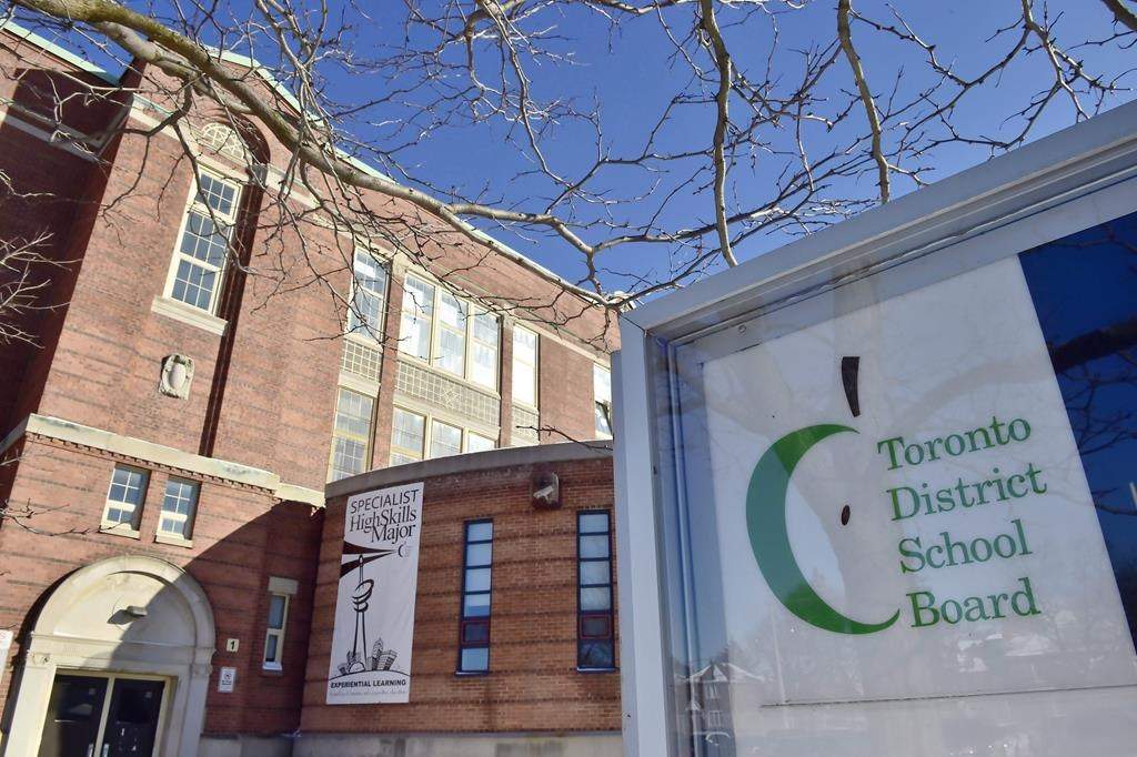 A Toronto District School Board sign is shown in front of a high school in Toronto on Tuesday, Jan. 30, 2018. THE CANADIAN PRESS/Frank Gunn.