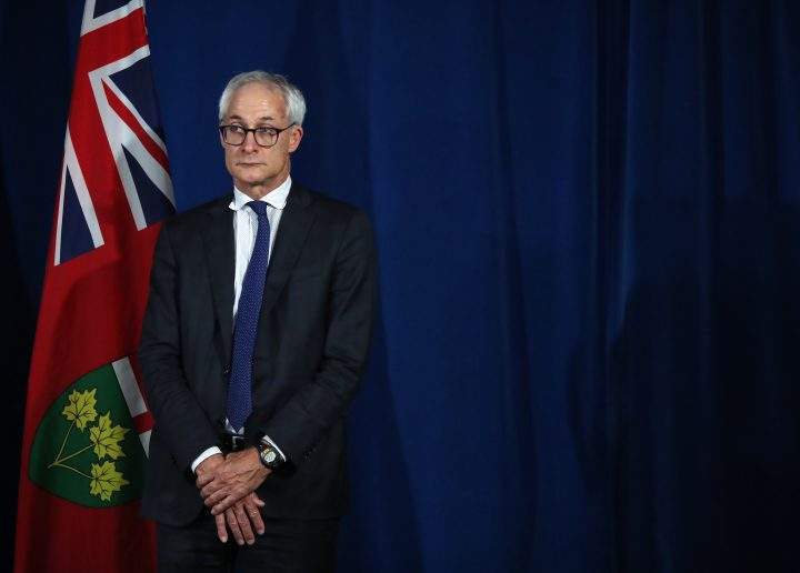 Ontario's chief coroner Dr. Dirk Huyer looks on during a COVID-19 press briefing at Queen's Park in Toronto on Tuesday, June 23, 2020.