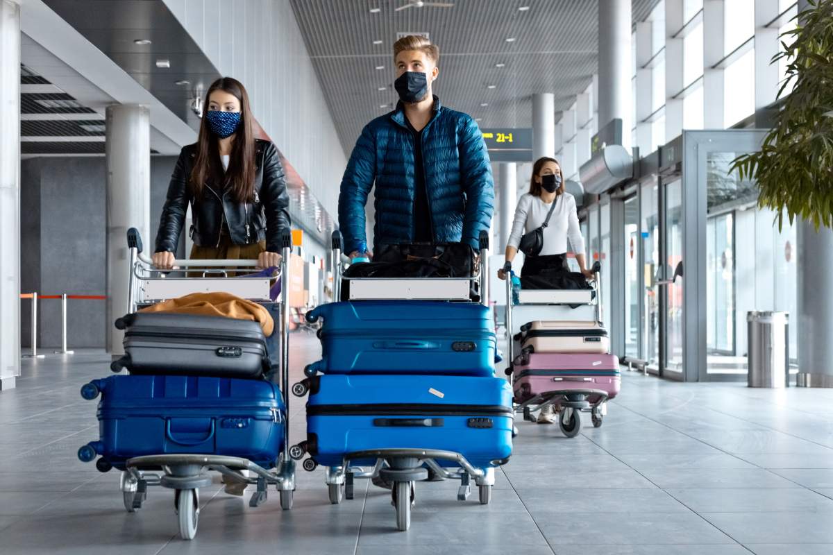People traveling by plane during COVID-19
