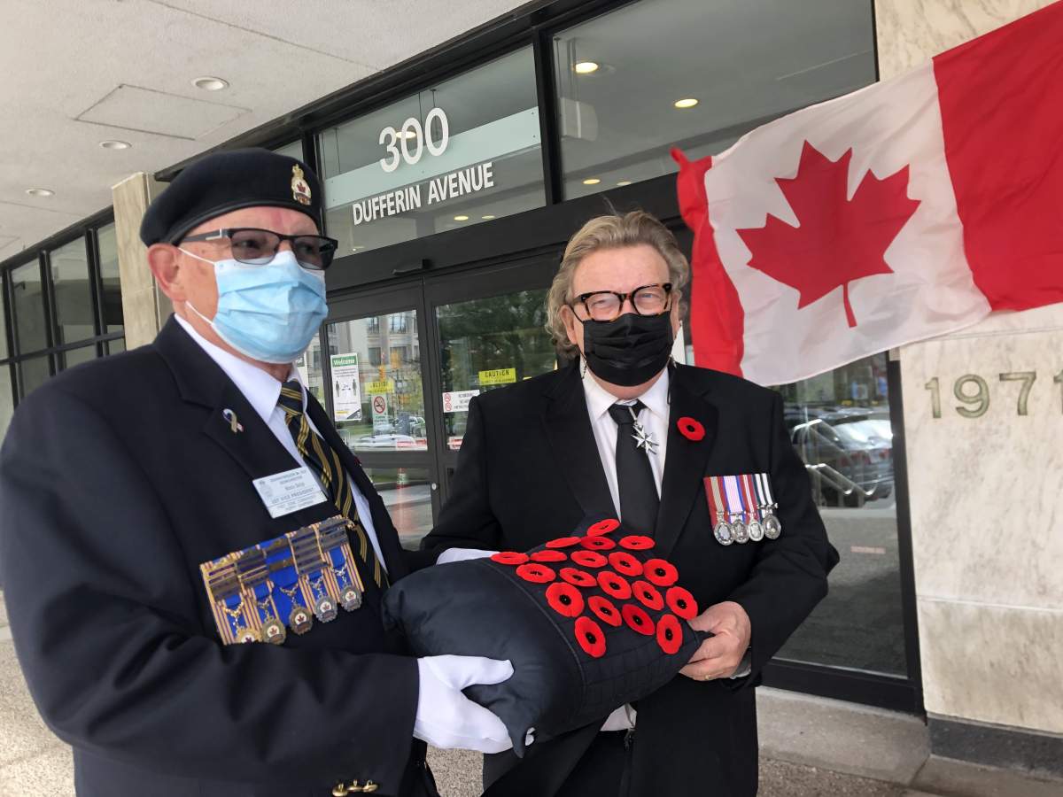 Poppy chairman Ross Seip (left) with London Mayor Ed Holder (right) at the launch of the 2021 poppy campaign at London City Hall on Oct. 28, 2021 .