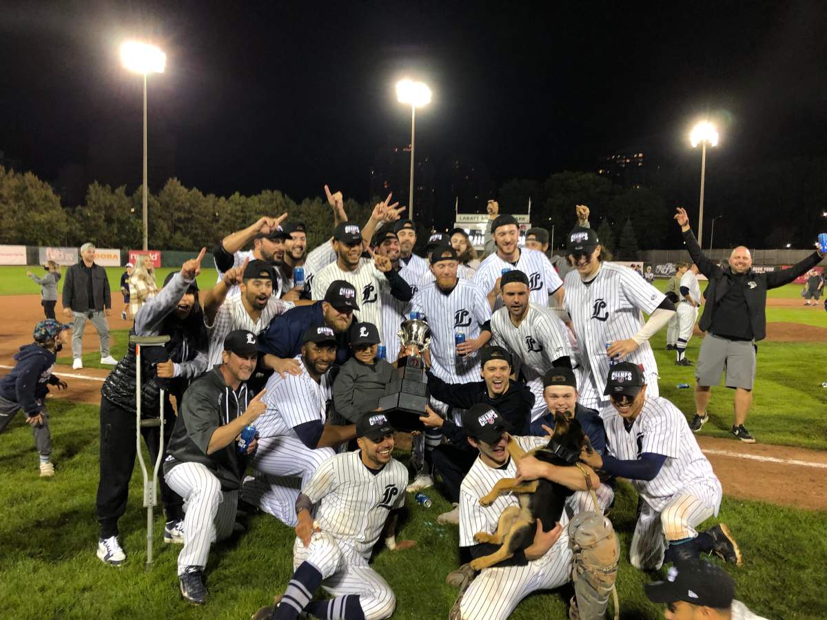 Cleveland Brownlee Jr. gets his hands on the Jack and Lynne Dominico Cup after his father helped the London Majors capture the IBL championships.