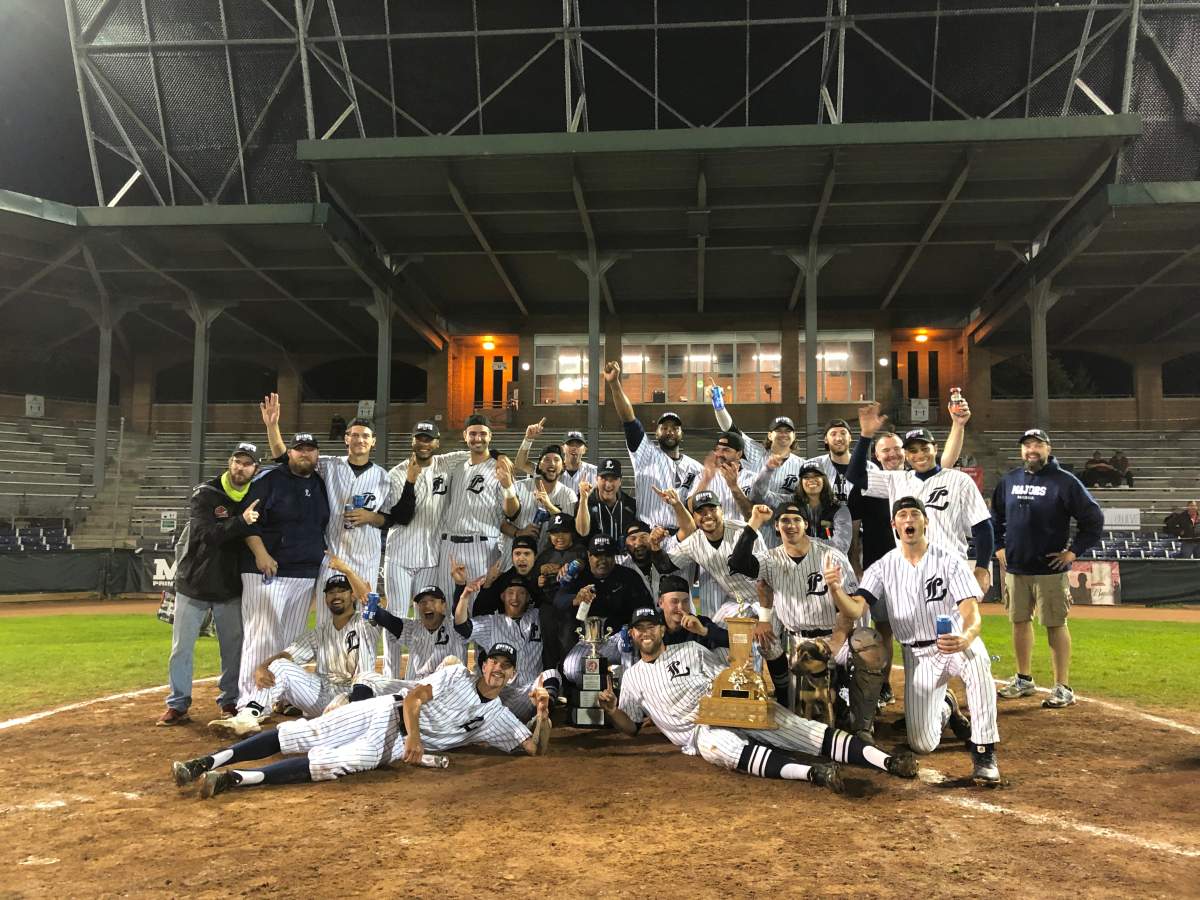 The London Majors pose with the Jack and Lynne Dominico Cup after the team captured its first IBL title in 46 years.