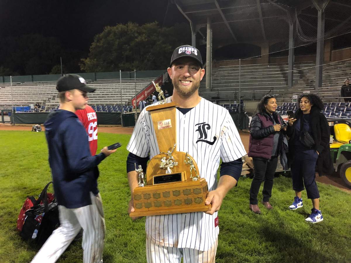 St. Thomas-born outfielder Byron Reichstein poses with a new piece of hardware after he was crowned playoff MVP at the end of Friday’s final.