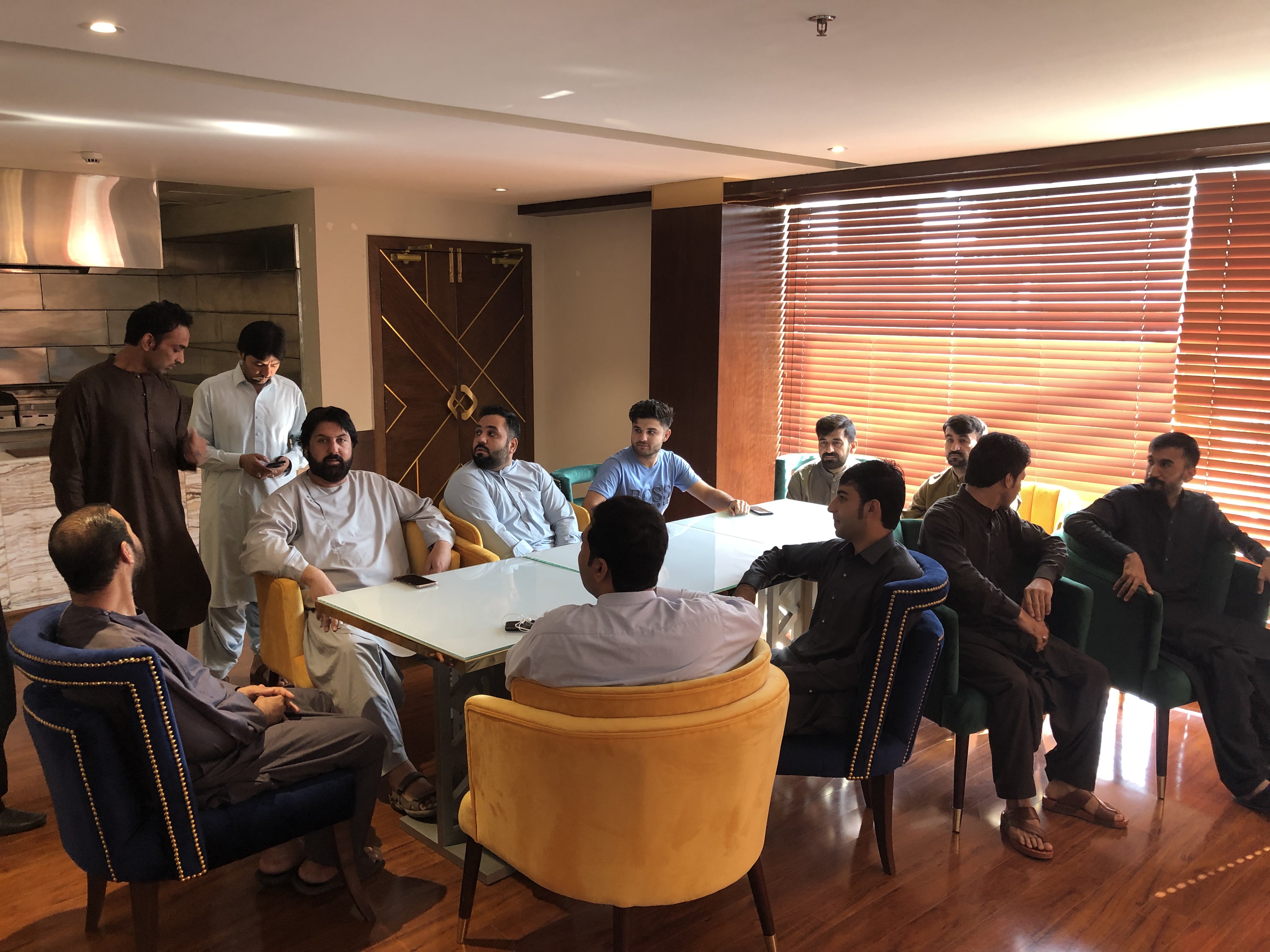 After escaping Taliban-controlled Afghanistan, men who worked for the Canadian Forces meet at their hotel in Islamabad.