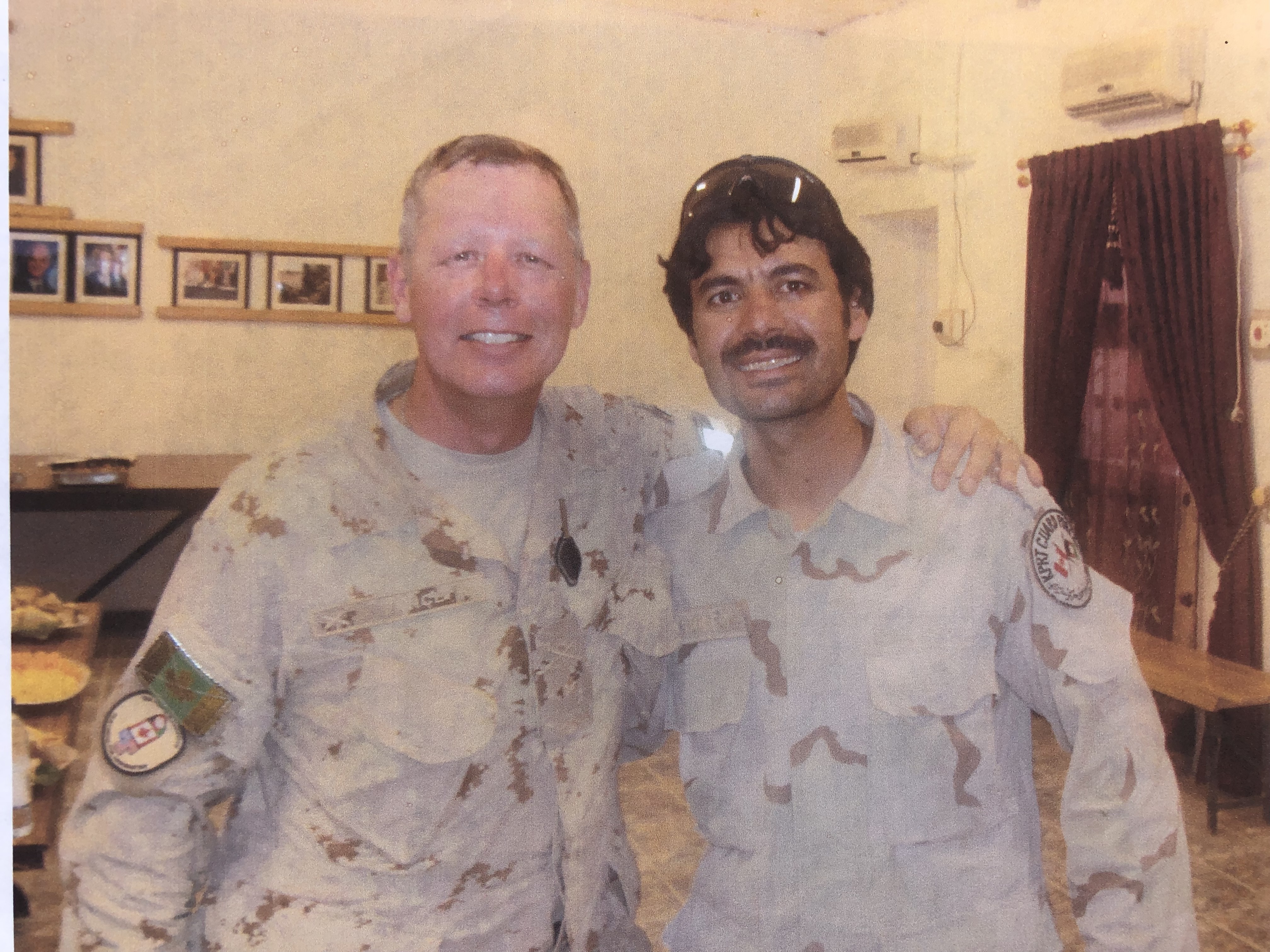 Undated photo of Gen. Jonathan Vance, Canada’s former chief of defence staff, with Mohammad “Captain Smiley” Ismail (right).