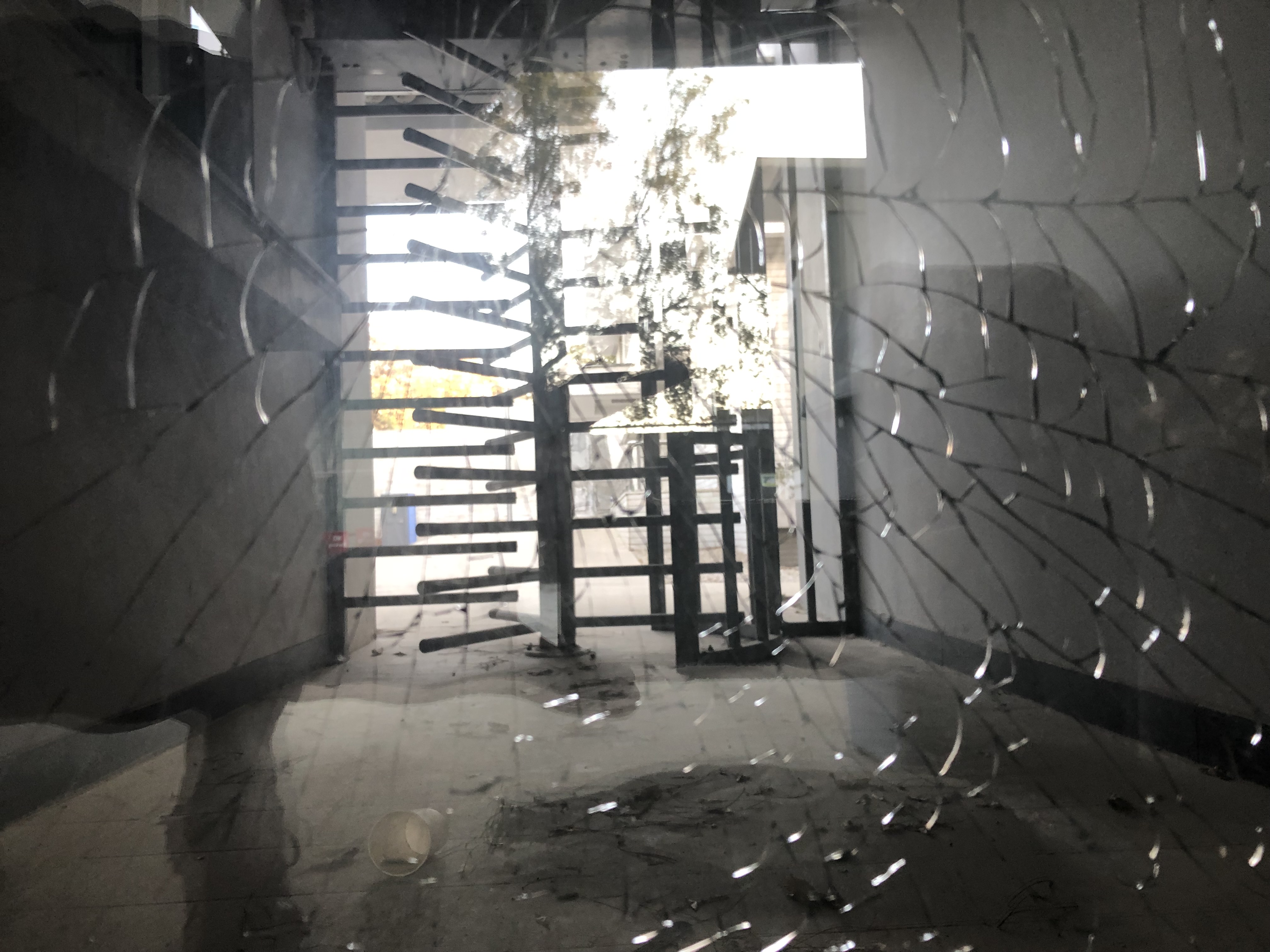 Shattered entry to the abandoned Canadian embassy, Kabul.
