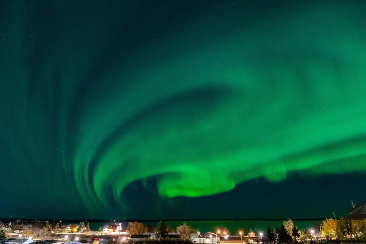 A vivid aurora borealis display in Lac La Biche, Alta., on Monday, Oct. 11, 2021.