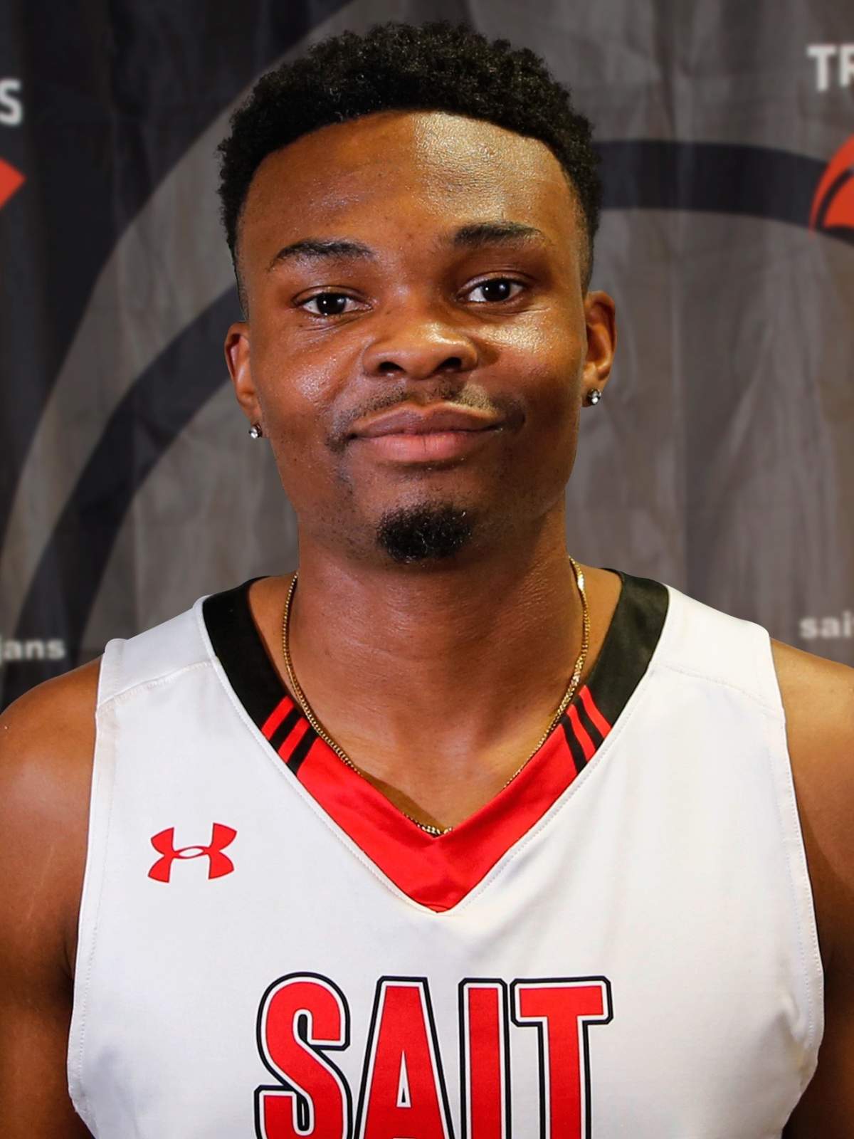 John Mitchell Smith Jr., 31, died after being shot outside a Calgary nightclub on Sunday, Oct. 10, 2021. Smith was an avid basketball coach and player.
