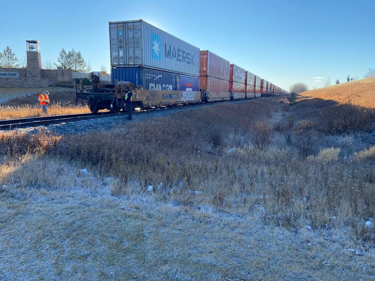 Edmonton police investigating a collision between a train and a pedestrian near Maple Road and 8 Street in southeast Edmonton on Tuesday, Oct. 26, 2021.