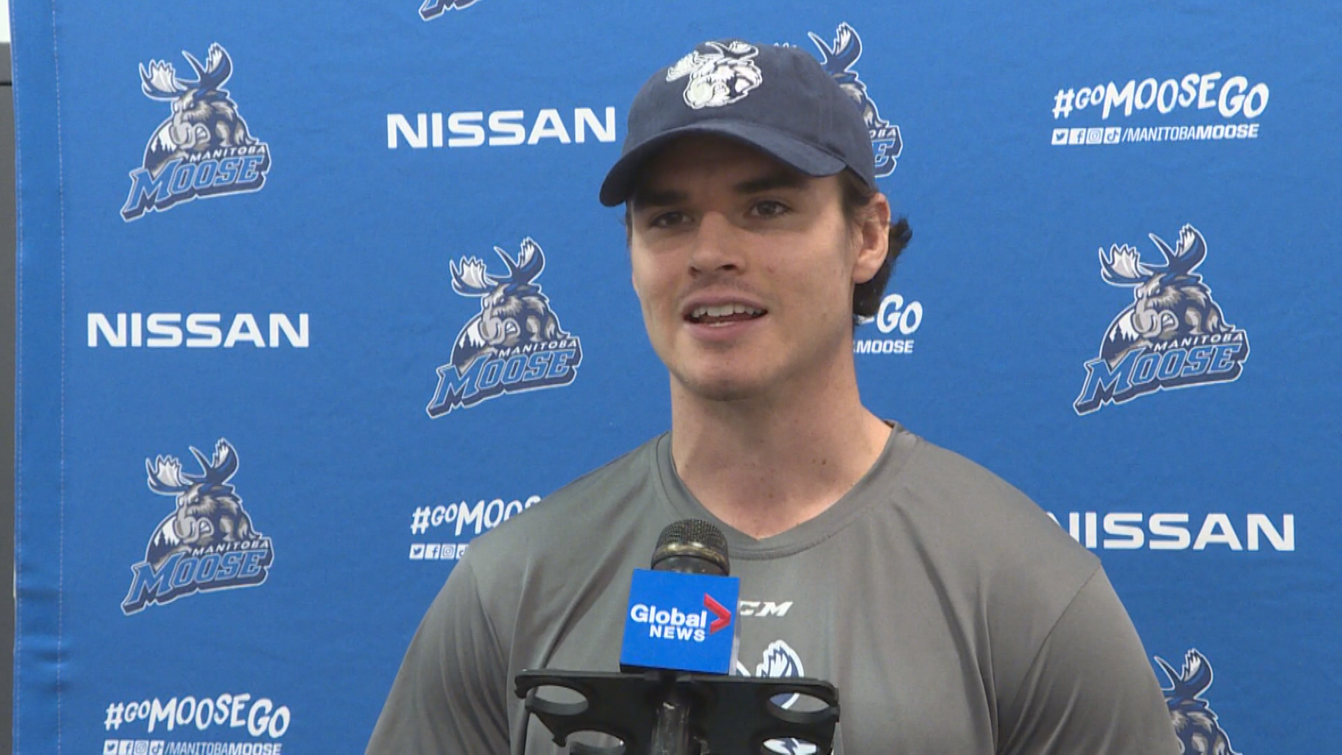 Jeff Malott chatting with Global News during Manitoba Moose training camp.