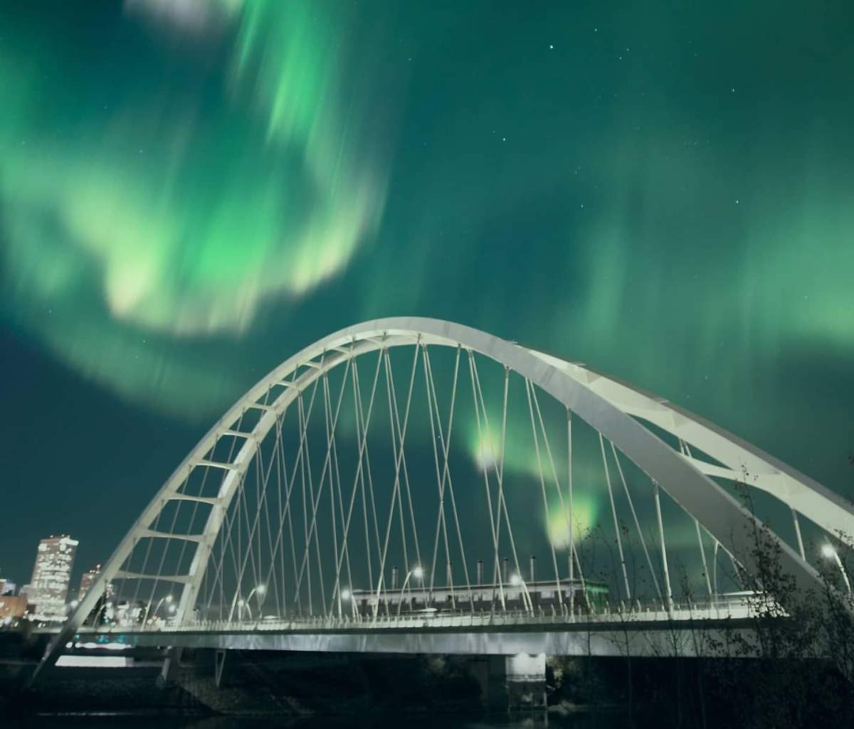 A vivid aurora borealis display at the Walterdale Bridge in central Edmonton on Monday, Oct. 11, 2021.