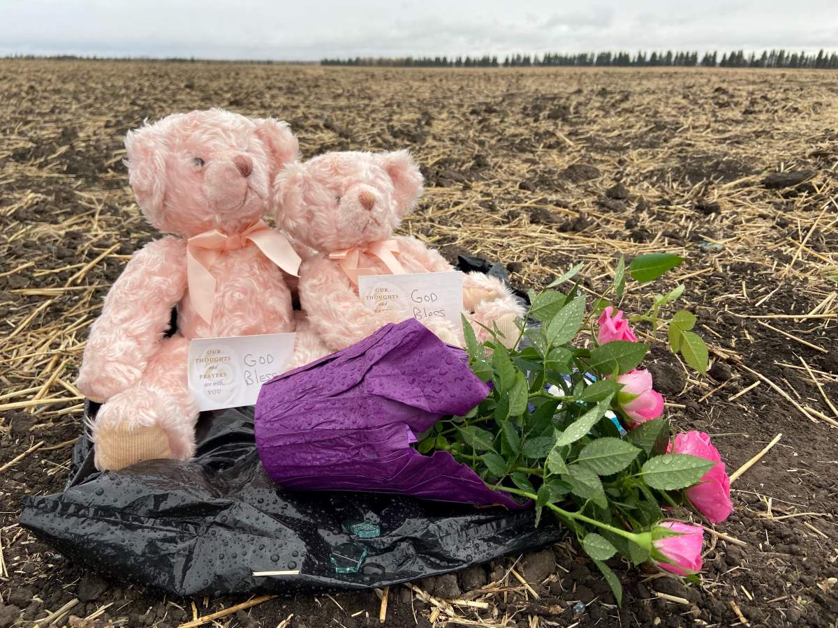A memorial at the scene of crash near Wetaskiwin, Alta., that killed two teens and sent three others to hospital. Sunday, Oct. 10, 2021.
