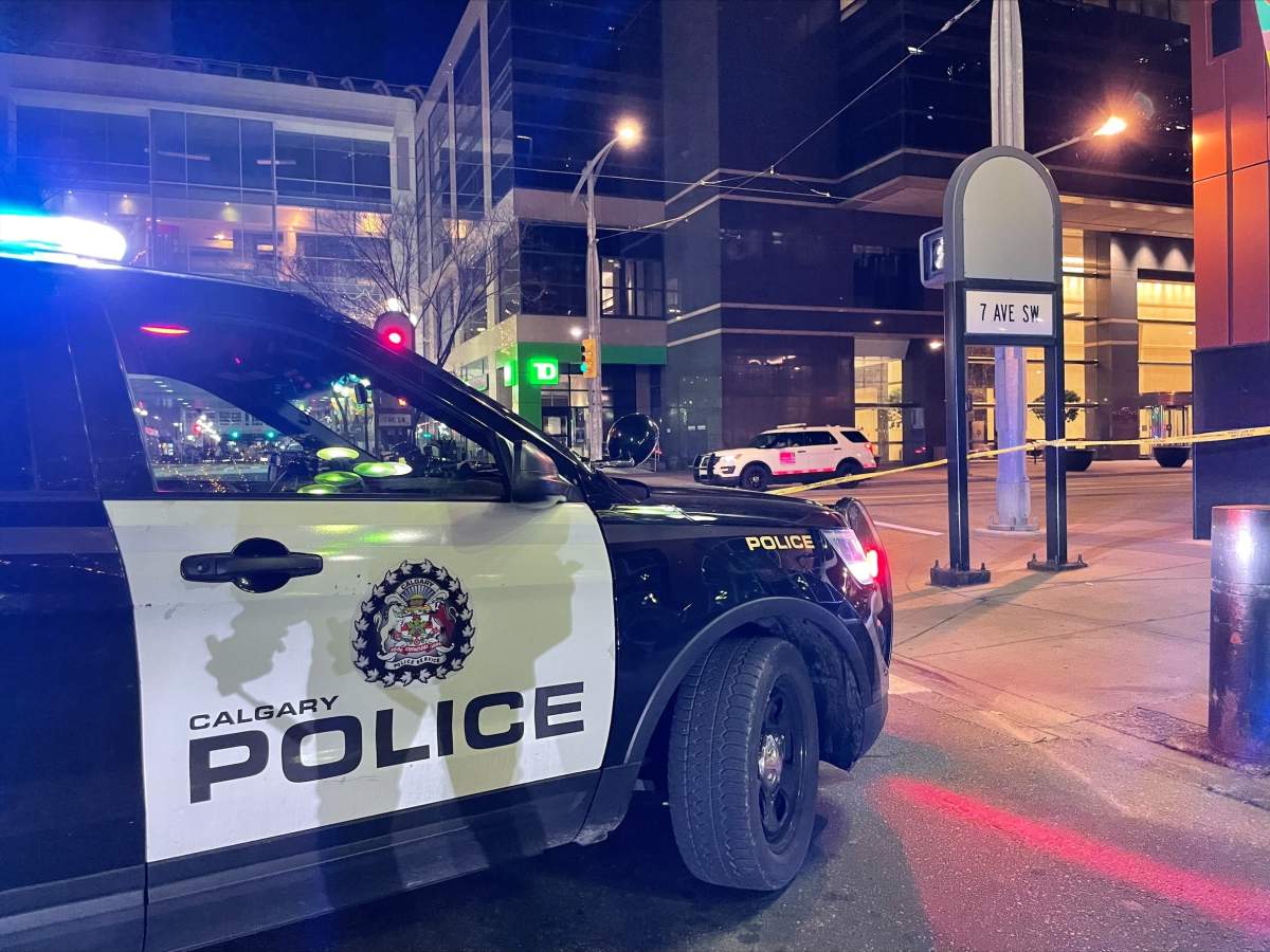 Calgary police cordoned off a section of the downtown core Friday, Oct. 15, 2021 as officers investigated two reported stabbings in the area.