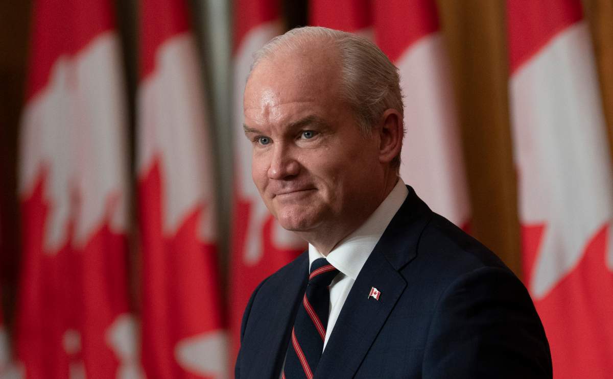 Conservative Leader and leader of the official opposition Erin O'Toole listens to a question from a reporter during a news conference following caucus in Ottawa, Tuesday, Oct. 5, 2021. THE CANADIAN PRESS/Adrian Wyld