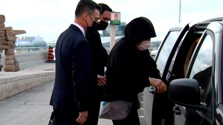 Nygard was escorted by police.