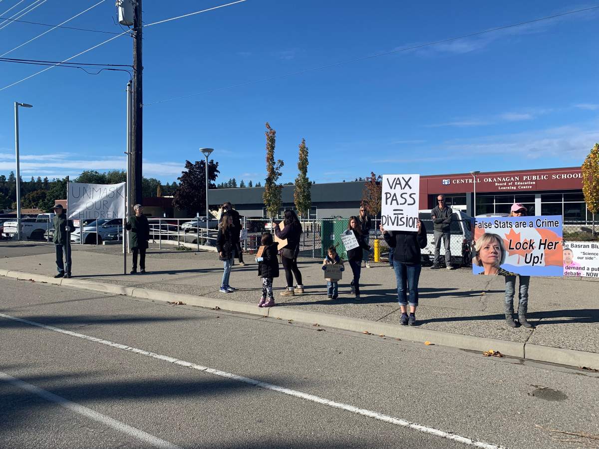 Anti-mask protesters rallied outside the Kelowna school board office on Wednesday, Oct. 6, 2021.