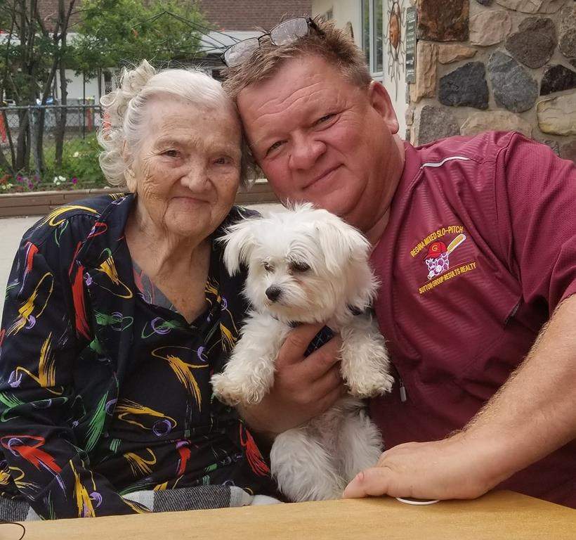 Brian Albert poses with his mother Marie in this undated handout photo. Last winter, when COVID-19 spread throughout Parkside Extendicare, a private long-term care home in Regina, Brian Albert was advised by staff to talk to a priest.