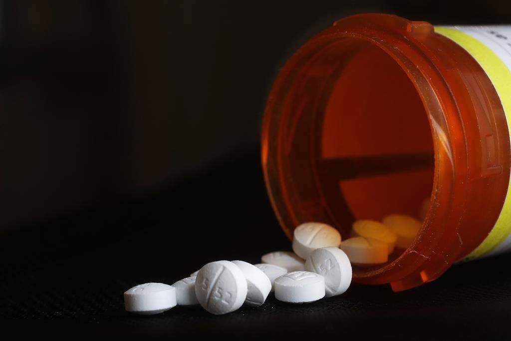 FILE - This photo shows an arrangement of Oxycodone pills in New York on Aug. 29, 2018.   