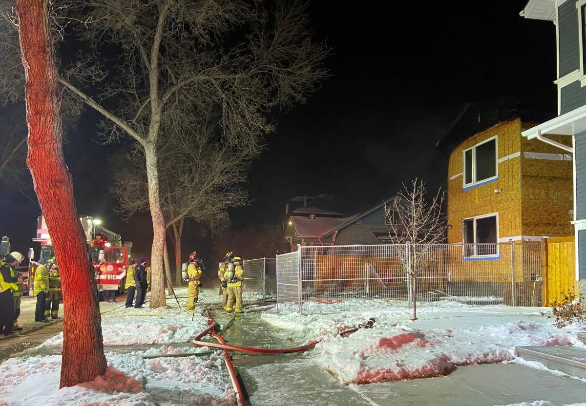 Edmonton Fire Rescue Services at a home under construction on 95A Street, north of 112 Avenue, on Monday, Nov. 22, 2021.
