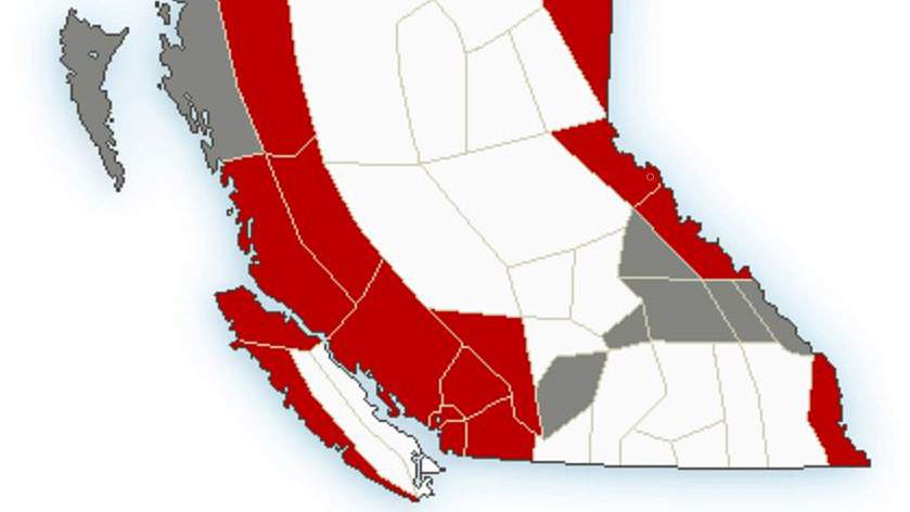 A map showing weather warnings in red and special weather statements in grey for B.C., on Tuesday, Nov. 30, 2021. A frontal system is expected to produce 40-50 mm of rain along the Coquihalla, and 30-70 mm from Eagle Pass to Rogers Pass on the Trans-Canada.