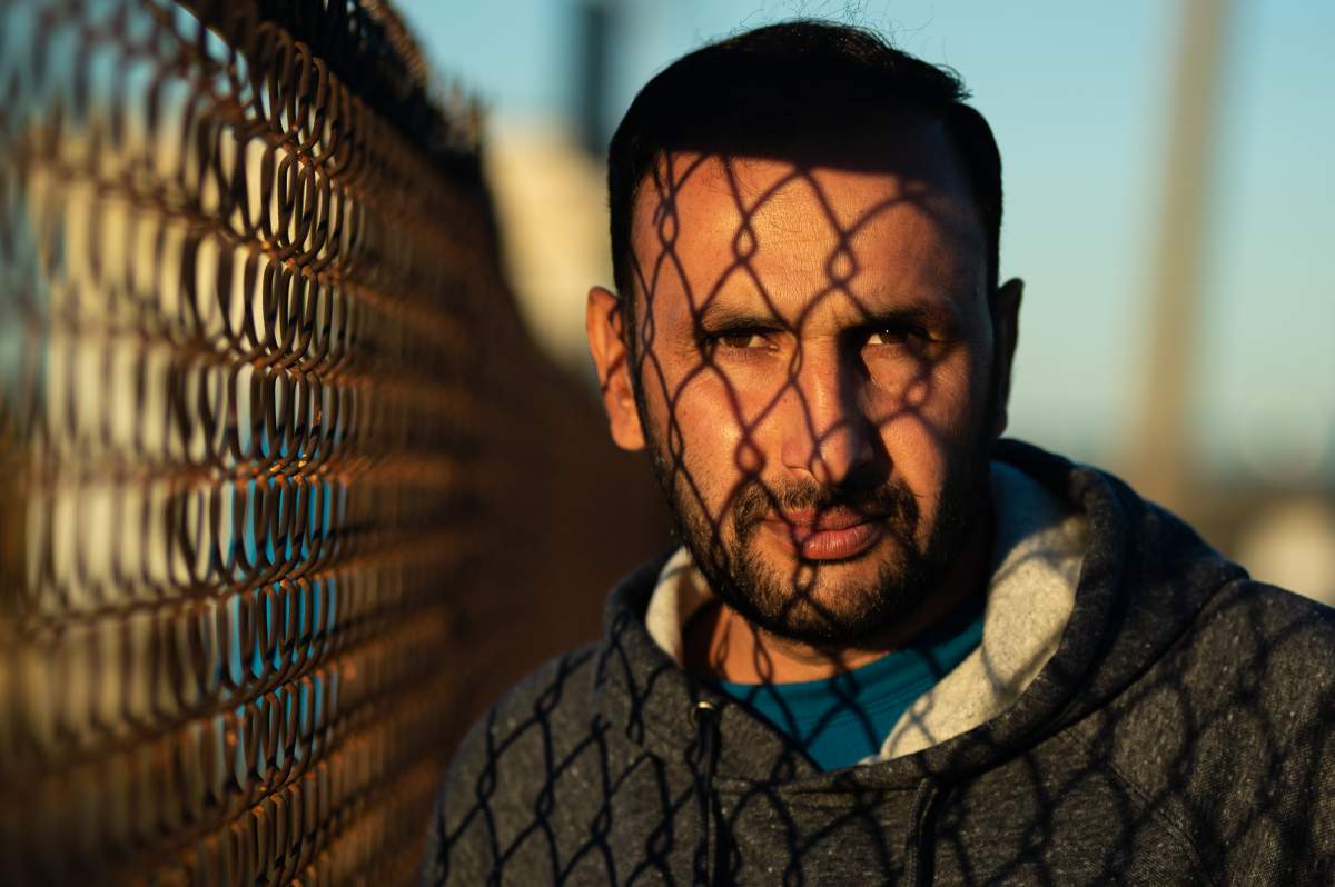 Sardar Khan Shinwari is photographed next to the hotel where he and his family are staying since arriving from Afghanistan, in Mississauga, Ont., on Wednesday, Oct. 27, 2021.
