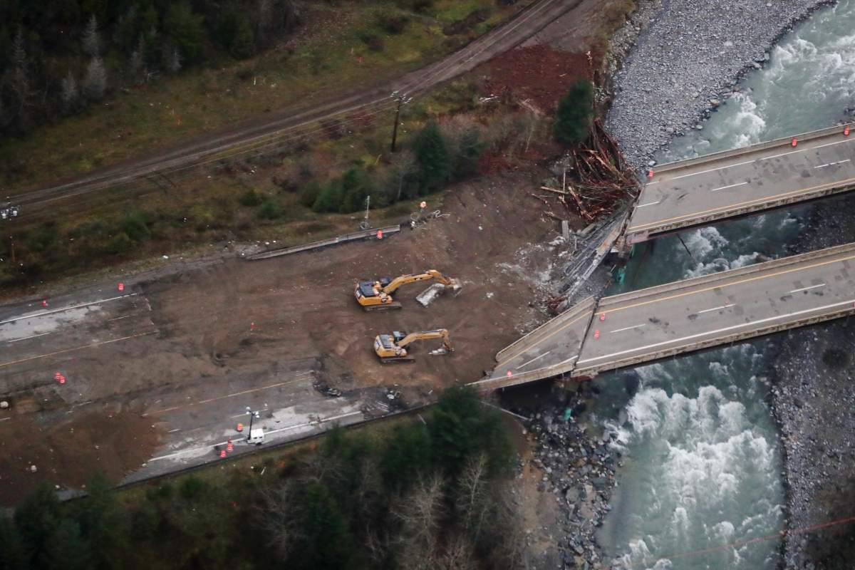 Work is being done on a section of the Coquihalla Highway after damage was caused by heavy rains and mudslides north of Hope, B.C., on Monday, November 22, 2021.