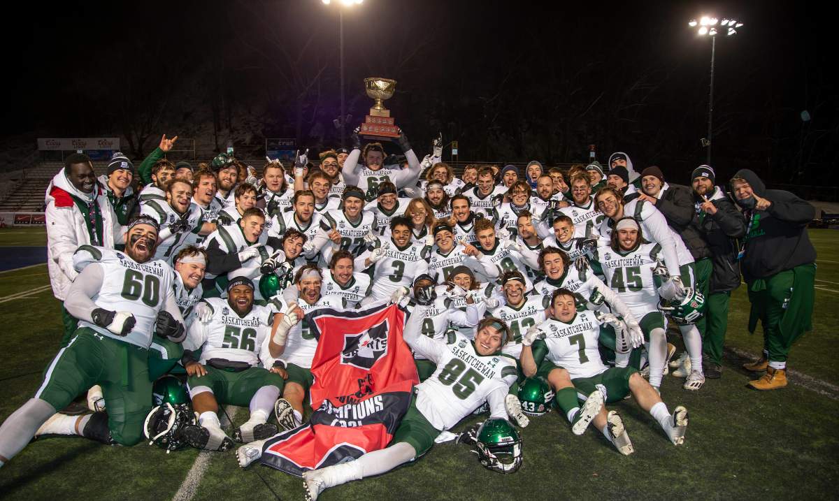 The University of Saskatchewan Huskies celebrate after defeating the University of Montreal Carabins in university football action to win the Uteck Bowl in Montreal on Nov. 27, 2021. 