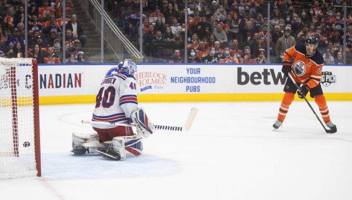 New York Rangers’ goalie Alexandar Georgiev (40) is scored on by Edmonton Oilers Leon Draisaitl (29) during overtime NHL action in Edmonton on Friday, November 5, 2021.