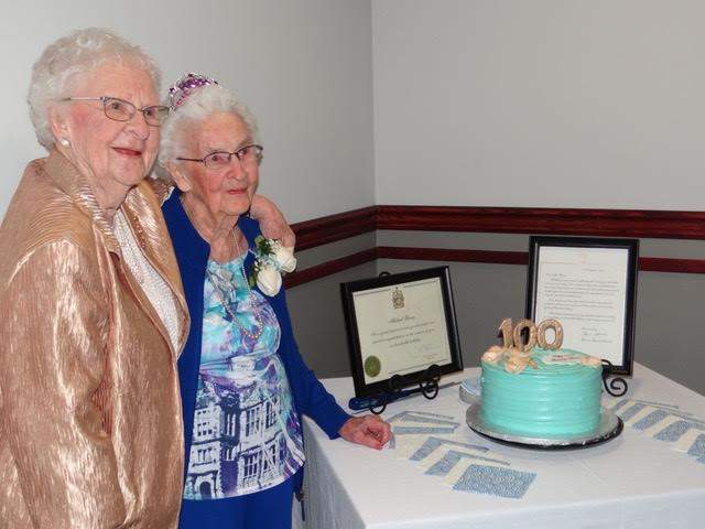 Roena Johnson celebrating Mildred’s 100th birthday.