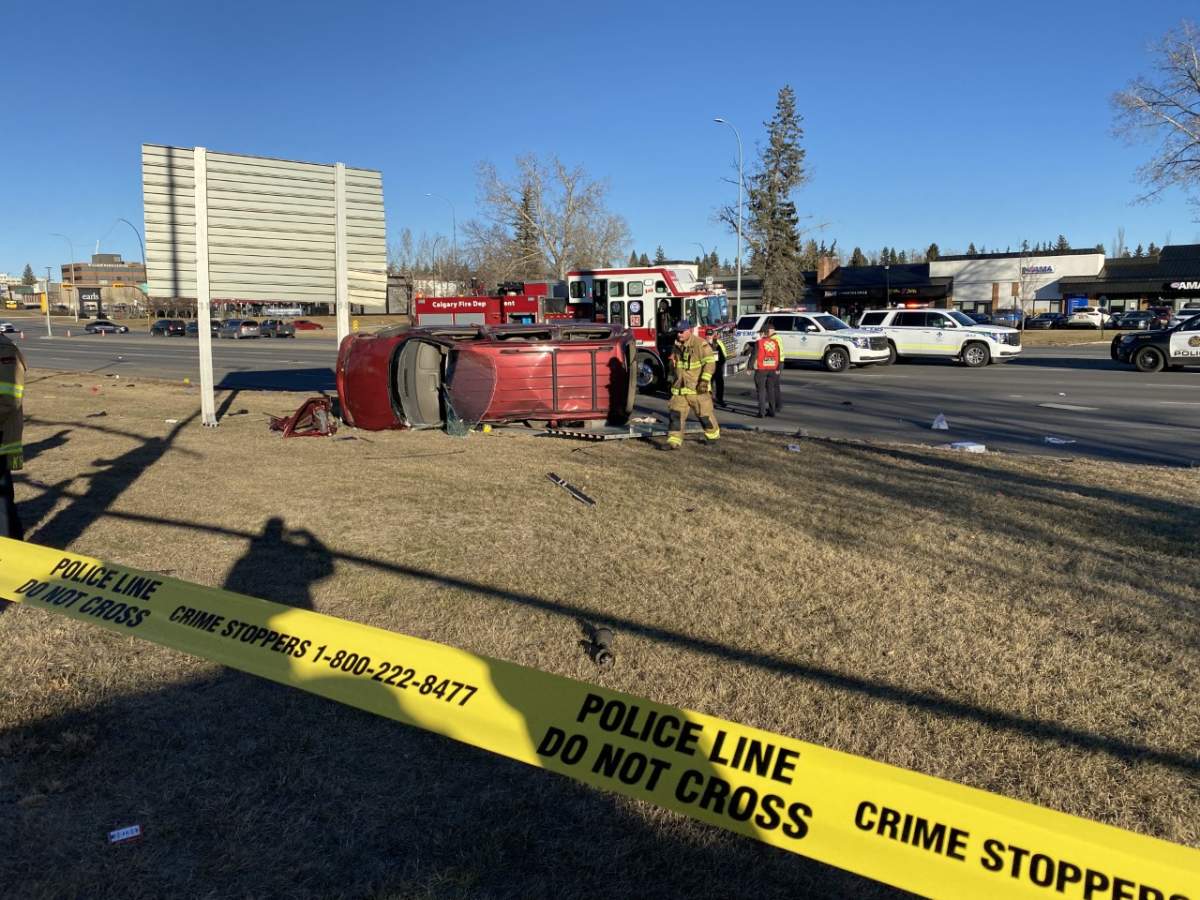 A vehicle is overturned near the corner of Macleod Trail and Willow Park Drive on Nov. 29, 2021.