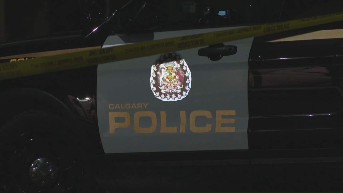 Calgary polce crime tape and vehicle