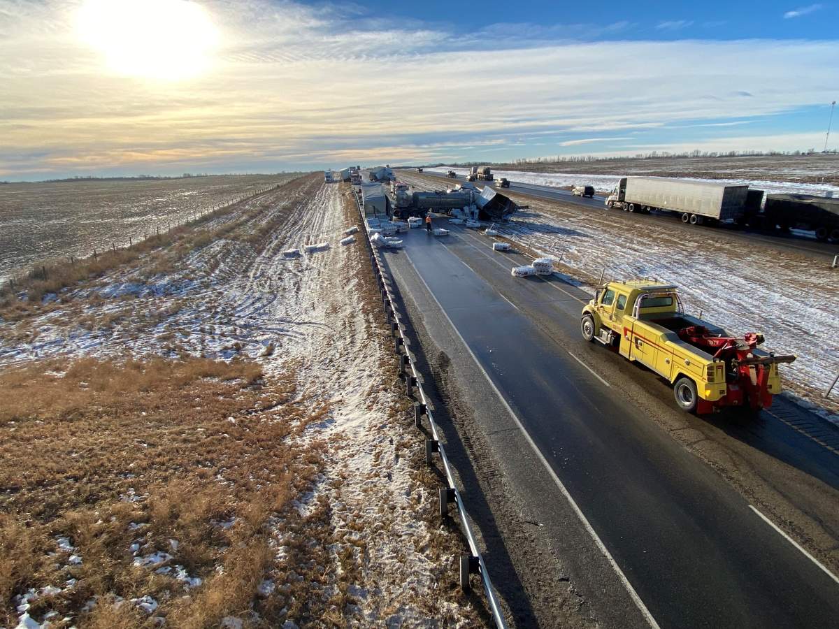1 killed in massive tractor trailer pileup on QEII near Ponoka after morning freezing rain - image