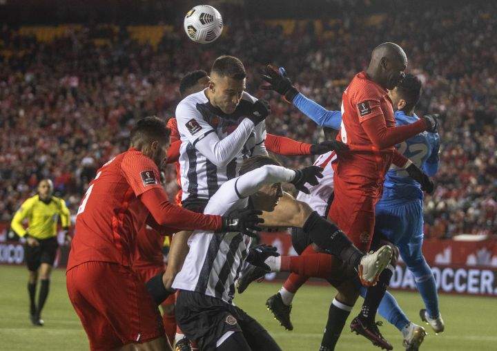 Team Canada and Costa Rica players vie for the ball on a corner kick during first half World Cup qualifier soccer action in Edmonton on Friday, November 12, 2021.