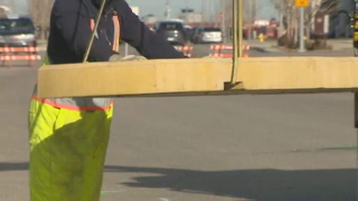 A crew of city workers began work on the new traffic safety measures in Harbour Landing on Thursday morning in Regina.
