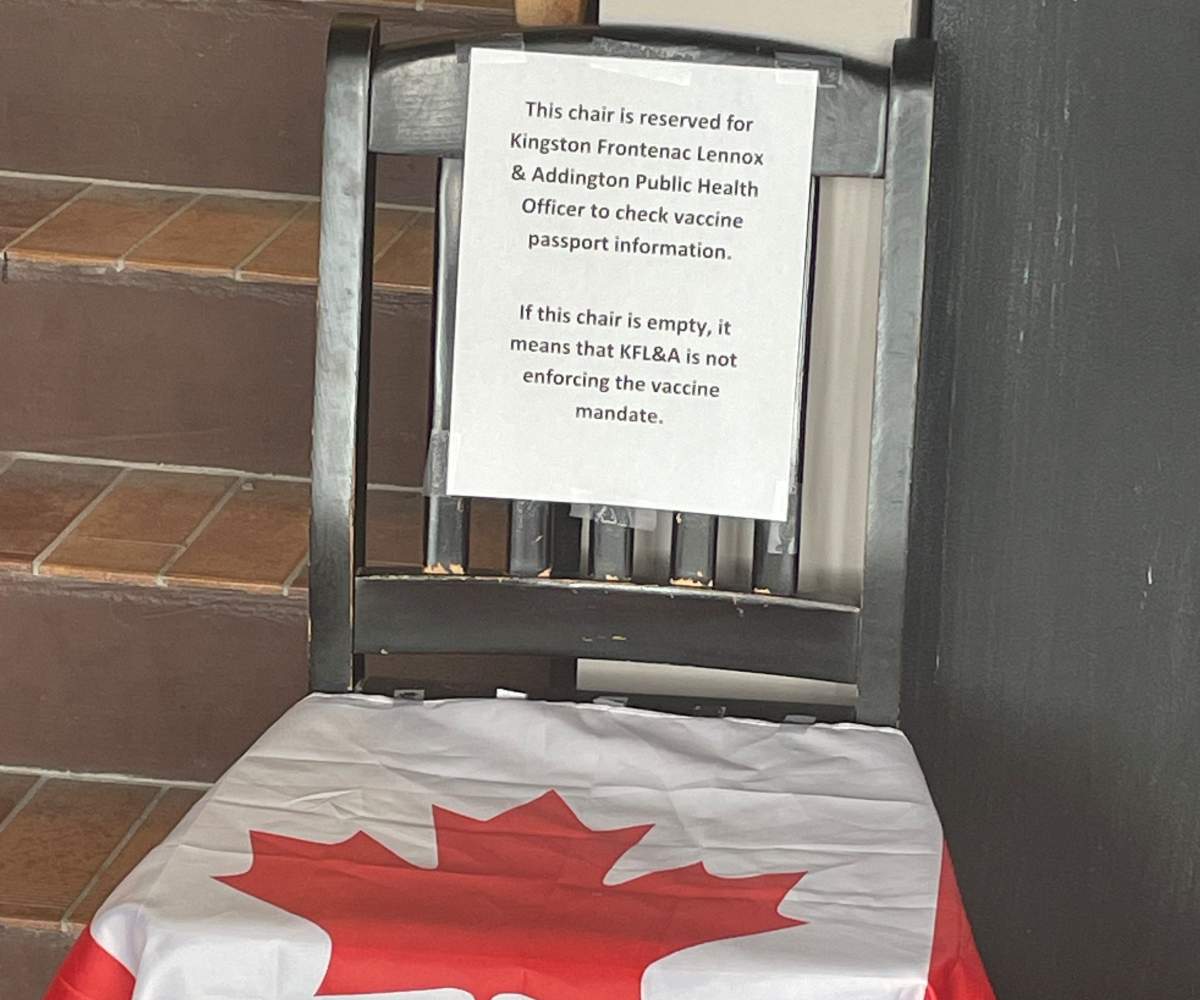 A chair at the entrance of Jakk Tuesdays mocking the health unit's efforts to impose COVID-19 vaccine certificates.