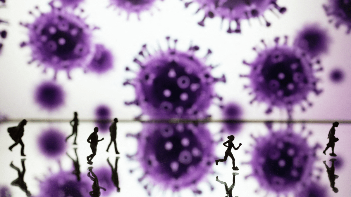 Small figurines are used to illustrate the virus during Covid-19 crisis. The Omicron coronavirus variant is likely to spread internationally, posing a "very high" global risk of infection surges that could have "severe consequences" some areas, the World Health Organisation (WHO) said on Monday. Photo by Aurore marechal/ABACAPRESS.COM .