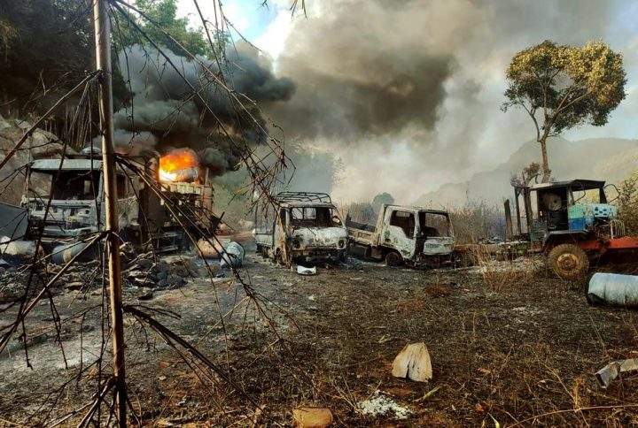 In this photo provided by the Karenni Nationalities Defense Force (KNDF), smokes and flames billow from vehicles in Hpruso township, Kayah state, Myanmar, Friday, Dec. 24, 2021. 