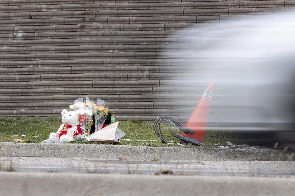 A memorial sits on Riverside Drive near Wonderland Road for victims of the fatal crash that took place on Nov. 30, 2021.